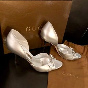Silver 4 inch Gucci dress sandal.